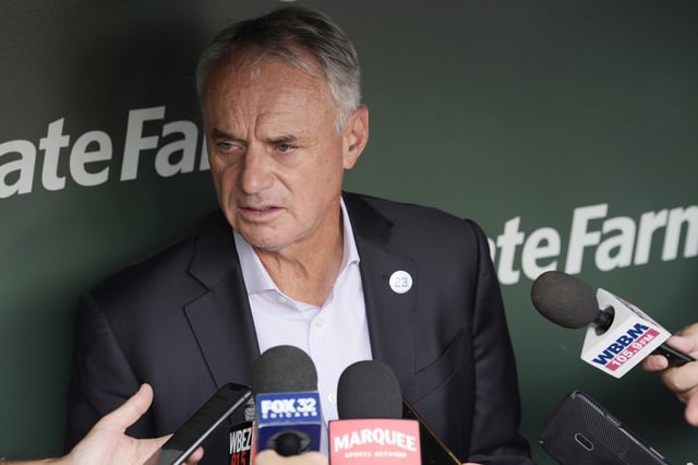 CHICAGO, ILLINOIS - AUGUST 01: Major League Baseball Commissioner Rob Manfred is interviewed during the 2027 Chicago All-Star Game Announcement before a game between the Baltimore Orioles and Chicago Cubs at Wrigley Field on August 01, 2025 in Chicago, Illinois.