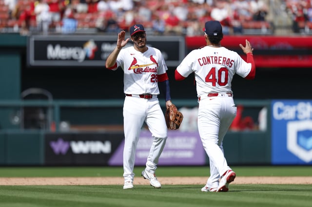 ST LOUIS, MISSOURI - APRIL 13: Nolan Arenado #28 of the St. Louis Cardinals celebrates with Willson Contreras #40 after the final out in a team victory over the Philadelphia Phillies at Busch Stadium on April 13, 2025 in St Louis, Missouri.