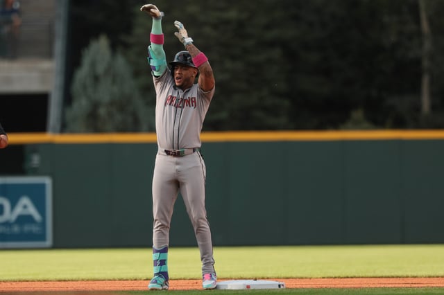 DENVER, COLORADO - AUGUST 16: Ketel Marte #4 of the Arizona Diamondbacks celebrates a double against the Colorado Rockies during the first inning at Coors Field on August 16, 2025 in Denver, Colorado.
