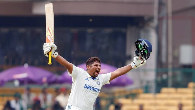 Sarfaraz Khan is celebrating his century in the 1st Test match of the series against New Zealand in 2024 | Image: ANI