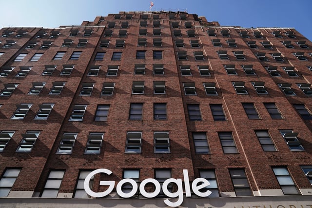 A Google sign is pictured on a Google building in the Manhattan borough of New York City, New York, U.S., October 20, 2020. REUTERS/Carlo Allegri