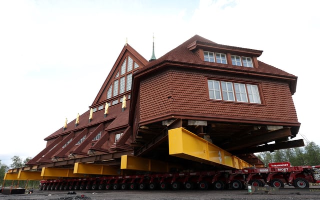 Kiruna's historic wooden church sits on wheels before being moved to its new site next to the cemetery, in Kiruna, Sweden August 17, 2025. REUTERS/Leonhard Foeger