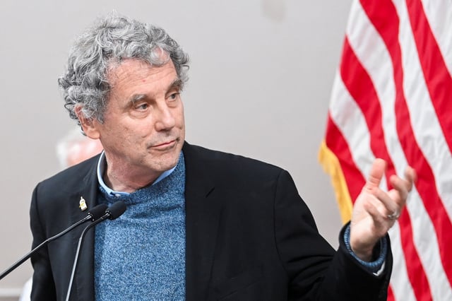 U.S. Sen. Sherrod Brown (D-OH) speaks during a press conference after inspecting the site of a train derailment of hazardous material in East Palestine, Ohio, U.S., February 16, 2023. REUTERS/Alan Freed/File Photo