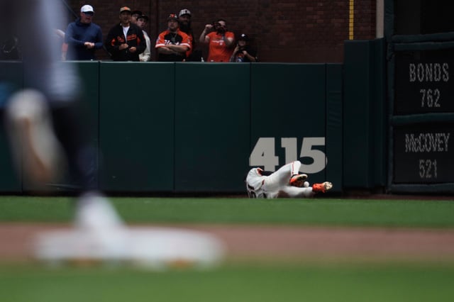 Jung makes the catch in the fourth inning.