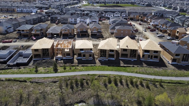 New homes are built in a housing construction development in the west-end of Ottawa on Thursday, May 6, 2021. THE CANADIAN PRESS/Sean Kilpatrick