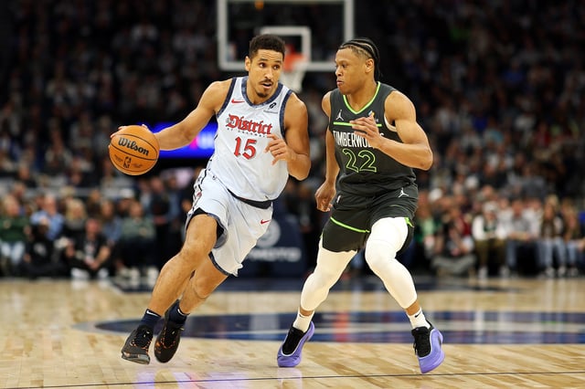 Malcolm Brogdon #15 of the Washington Wizards drives to the basket against Jaylen Clark #22 of the Minnesota Timberwolves in the third quarter at Target Center on February 01, 2025 in Minneapolis, Minnesota.