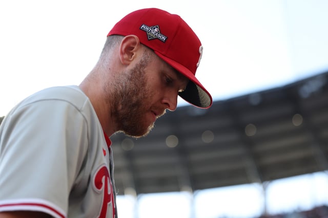 ATLANTA, GEORGIA - OCTOBER 09: Zack Wheeler #45 of the Philadelphia Phillies walks to the dugout before the start of Game Two of the Division Series against the Atlanta Braves at Truist Park on October 09, 2023 in Atlanta, Georgia. (Photo by Elsa/Getty Images)