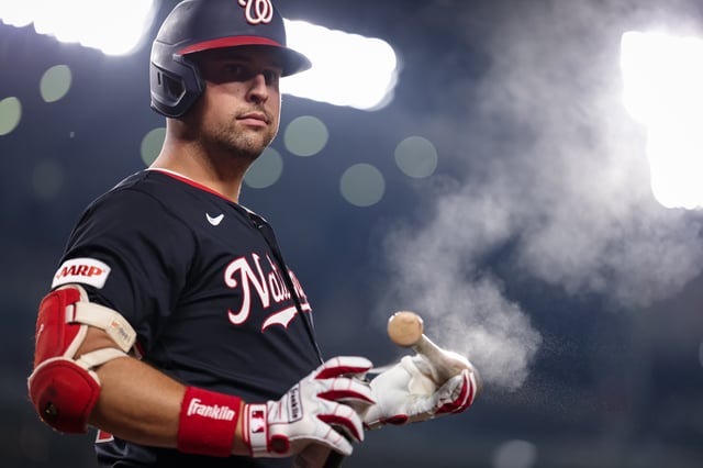 WASHINGTON, DC - AUGUST 05: Nathaniel Lowe #33 of the Washington Nationals warms up during the sixth inning against the Athletics at Nationals Park on August 5, 2025 in Washington, DC.