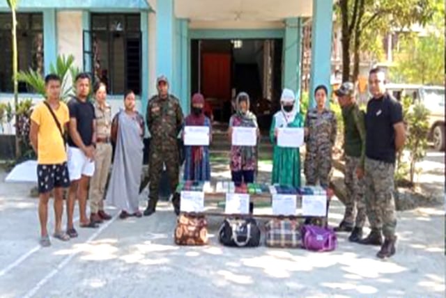 The accused and seized drugs in police custody.