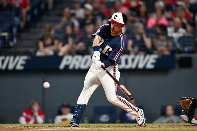 CLEVELAND, OHIO - AUGUST 15: Steven Kwan #38 of the Cleveland Guardians hits a single during the sixth inning against the Atlanta Braves at Progressive Field on August 15, 2025 in Cleveland, Ohio.