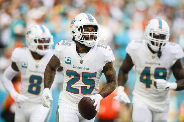 Nov 27, 2022; Miami Gardens, Florida, USA; Miami Dolphins cornerback Xavien Howard (25) scores a touchdown after recovering a fumble during the second quarter against the Houston Texans at Hard Rock Stadium. Mandatory Credit: Sam Navarro-USA TODAY Sports/File Photo