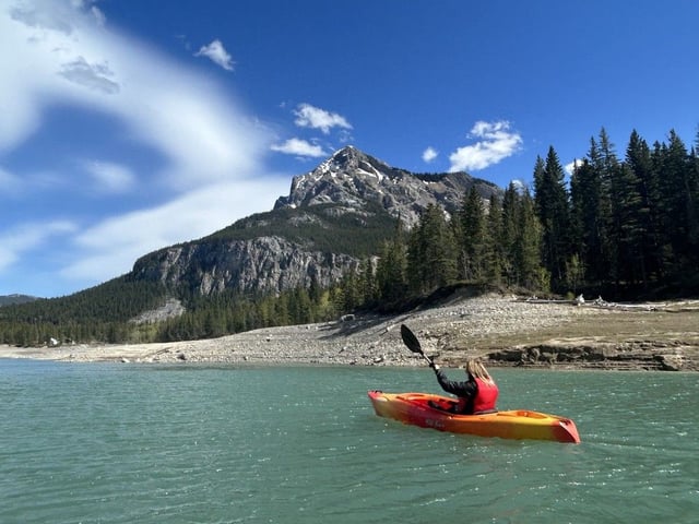 A file photo of a person kayaking on Barrier Lake. Photo, Andrew Penner
