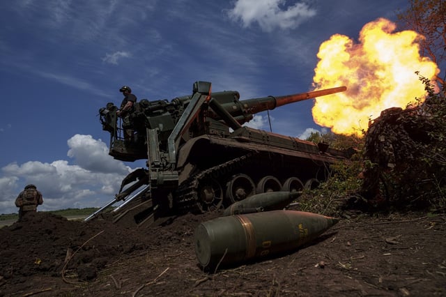 Ukrainian soldiers fire on Russian positions along the front line in the Donetsk region of Ukraine on Monday, June 24, 2024.