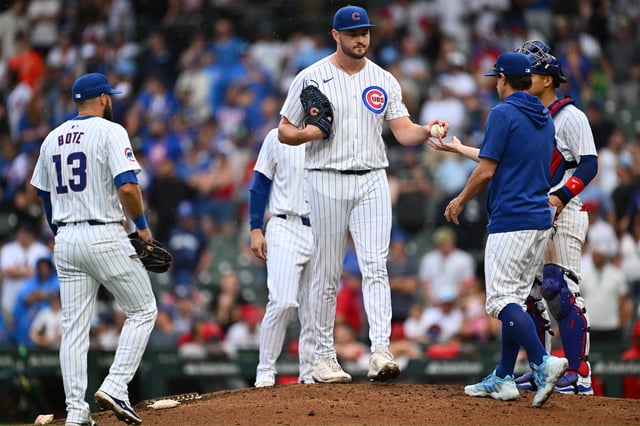 CHICAGO, IL - JULY 07: Pitcher Luke Little #43 of the Chicago Cubs is pulled from game in the ninth inning against the Los Angeles Angels by manager Craig Counsell #30 at Wrigley Field on July 07, 2024 in Chicago, Illinois. Chicago defeated Los Angeles 5-0.
