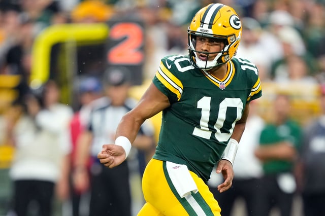 Aug 9, 2025; Green Bay, Wisconsin, USA;  Green Bay Packers quarterback Jordan Love (10) watches the ball after handing it off during the first quarter against the New York Jets at Lambeau Field. Mandatory Credit: Kayla Wolf-Imagn Images/File Photo