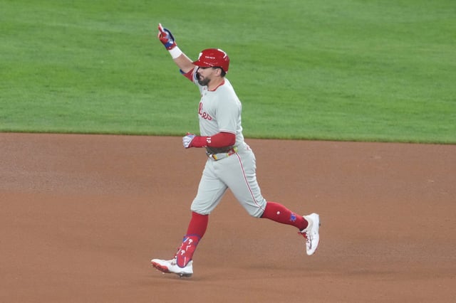 WASHINGTON, DC - AUGUST 15: Kyle Schwarber #12 of the Philadelphia Phillies celebrates hitting a three run home run in the seventh inning during a baseball game against the Washington Nationals at Nationals Park on August 15, 2025 in Washington, DC.