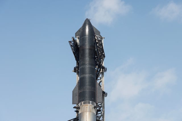 SpaceX's next-generation Starship spacecraft atop its Super Heavy booster is prepared for launch on its ninth test Tuesday, May 27 at the company's launch pad in Starbase, Texas.