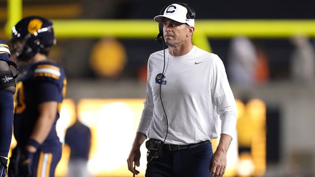Oct 5, 2024; Berkeley, California, USA; California Golden Bears head coach Justin Wilcox walks on the field during a timeout in the second quarter against the Miami Hurricanes at California Memorial Stadium. Mandatory Credit: Darren Yamashita-Imagn Images