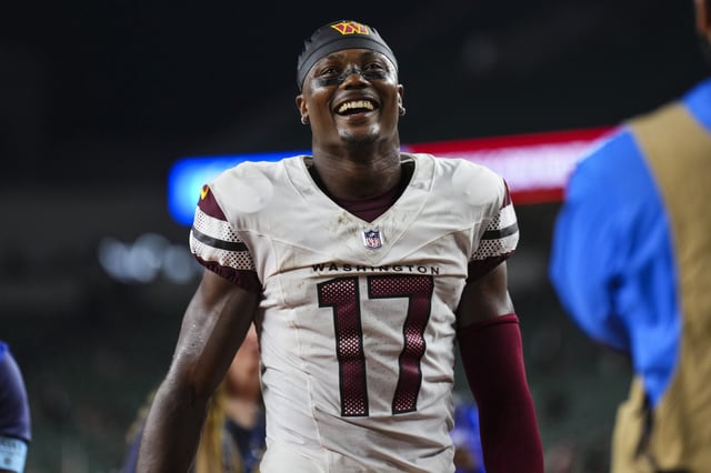 Terry McLaurin #17 of the Washington Commanders celebrates after an NFL football game against the Cincinnati Bengals at Paycor Stadium on September 23, 2024 in Cincinnati, Ohio.