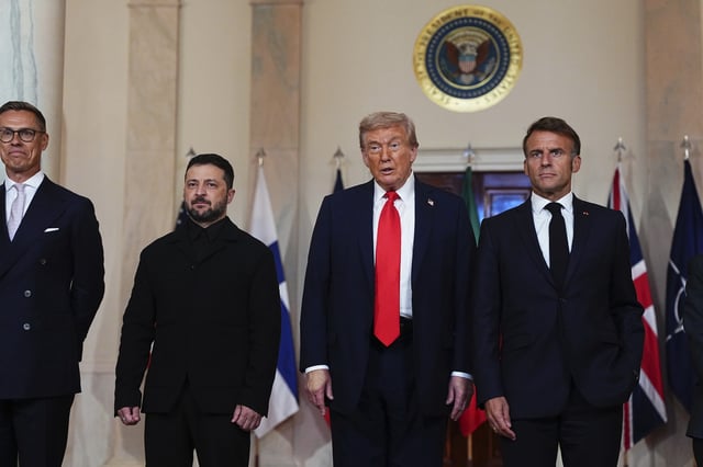 President Alexander Stubb of Finland, President Volodymyr Zelensky of Ukraine, United States President Donald J Trump, and President Emmanuel Macron of France are shown in the Cross Hall of the White House in Washington, D.C.