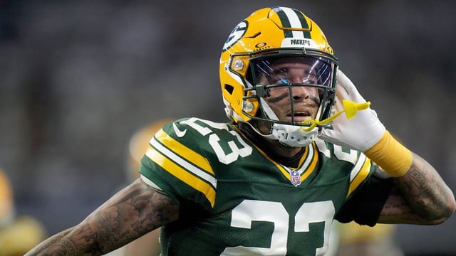 Green Bay Packers cornerback Jaire Alexander (23) reacts after intercepting a pass during the first quarter of the wild card playoff game against the Dallas Cowboys Sunday, January 14, 2024 at AT&amp;T Stadium in Arlington, Texas.