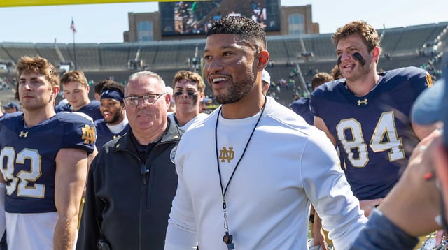 Apr 12, 2025; Notre Dame, IN, USA; Notre Dame Fighting Irish head coach Marcus Freeman smiles as he walks off the field after the Blue-Gold game at Notre Dame Stadium. Mandatory Credit: Michael Caterina-Imagn Images