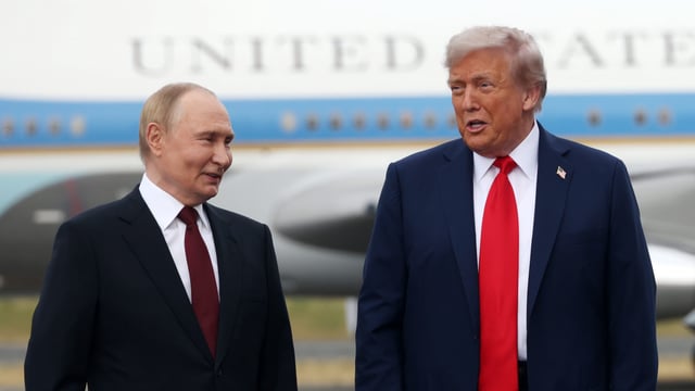 ANCHORAGE, ALASKA – AUGUST 15:  (RUSSIA OUT) Russian President Putin (L) and U.S. President Donald Trump (R) pose for a photo during the welcoming ceremony prior to the meeing on war in Ukraine at U.S. Air Base at U.S. Air Base In Alaska on August 15, 2025, in Anchorage, Alaska, United States. Putin is having a one-day trip to Alaska. (Photo by Contributor/Getty Images)