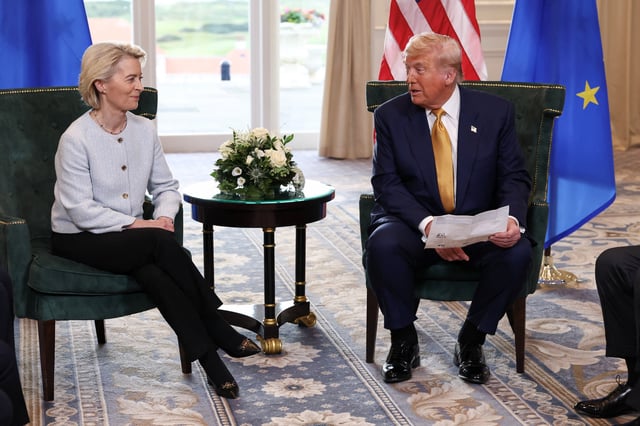 U.S. President Donald Trump sits with European Commission President Ursula von der Leyen, after the announcement of a trade deal between the U.S. and EU, in Turnberry, Scotland, Britain, July 27, 2025. REUTERS/Evelyn Hockstein/File Photo