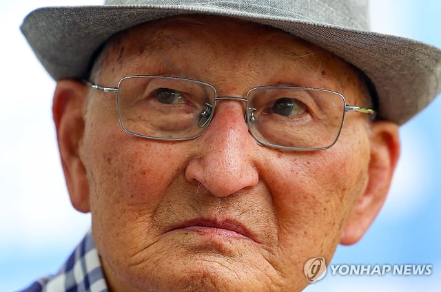 This file photo shows Ahn Hak-sop, 95, a former North Korean spy agent, ahead of a press conference in Seoul on Aug. 8, 2025, calling on the government to repatriate him to North Korea. (Yonhap)  