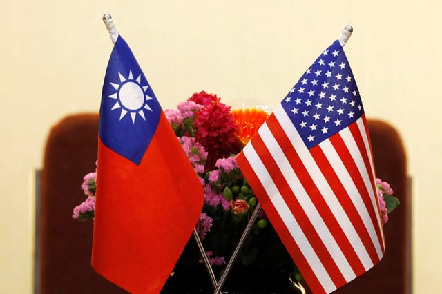 Flags of Taiwan and U.S. are placed for a meeting in Taipei, Taiwan March 27, 2018. REUTERS/Tyrone Siu/File Photo