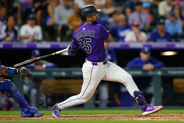 DENVER, CO – AUGUST 18:  Warming Bernabel #25 of the Colorado Rockies hits a walk-off RBI single in the ninth inning against the Los Angeles Dodgers at Coors Field on August 18, 2025 in Denver, Colorado. The Rockies won 4-3. (Photo by Justin Edmonds/Getty Images)