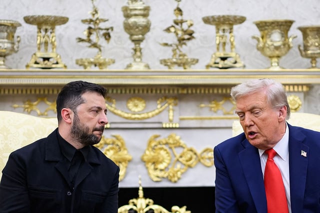 Ukrainian President Volodymyr Zelensky and US President Donald Trump participate in a meeting in the Oval Office of the White House in Washington, DC, on August 18, 2025.