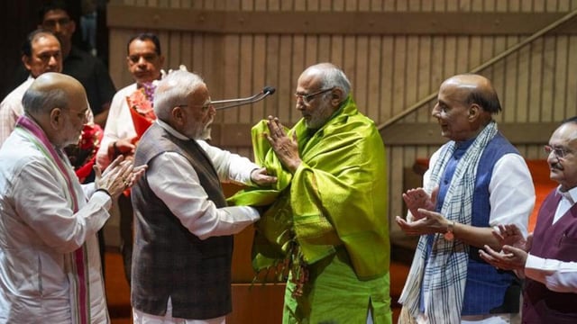 Radhakrishnan was felicitated at the meeting of MPs. (PTI photo)