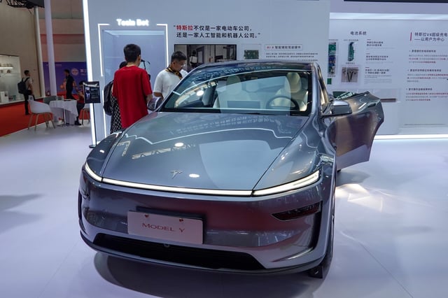 BEIJING, CHINA - 2025/07/18: A silver Tesla Model Y seen on display at the 3rd China International Supply Chain Expo. The third edition of the Third China International Supply Chain Expo (CISCE) has brought together more than 650 companies and institutions from 75 countries and regions. And the organiser of the expo is China Council for the Promotion of International Trade. (Photo by Sheldon Cooper/SOPA Images/LightRocket via Getty Images)