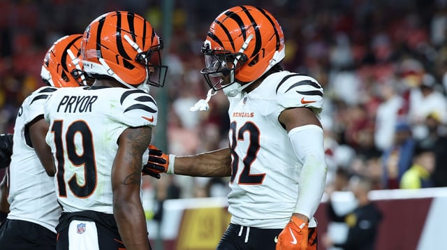 Aug 18, 2025; Landover, Maryland, USA; Cincinnati Bengals wide receiver Mitchell Tinsley (82) celebrates with teammates after scoring a touchdown against the Washington Commanders during the first half at Northwest Stadium. Mandatory Credit: Amber Searls-Imagn Images