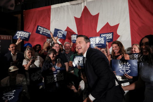 Canada's federal Conservative leader Pierre Poilievre greets supporters after winning a by-election in Alberta's Battle River-Crowfoot riding, after he lost his long-held Ottawa constituency in the general election, in Camrose, Alberta, Canada, August 18, 2025.  REUTERS/Amber Bracken