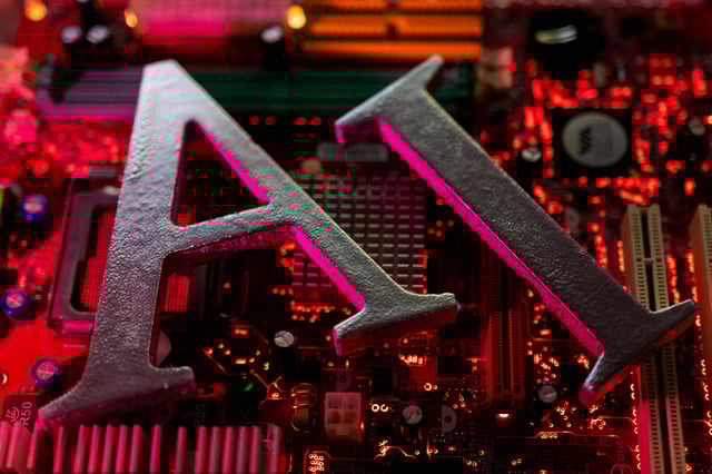 AI (Artificial Intelligence) letters are placed on computer motherboard in this illustration created on June 23, 2023. REUTERS/Dado Ruvic/Illustration/File Photo