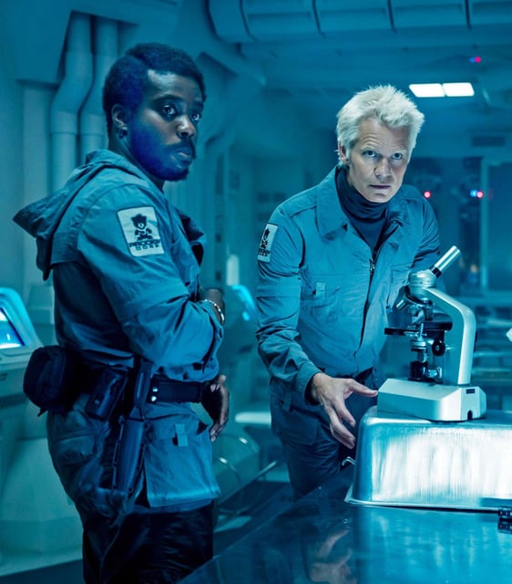 Jonathan Ajayi plays Smee and Timothy Olyphant portrays Kirsh in the new version of “Alien,” called “Alien: Earth” and streaming on Hulu. (Patrick Brown/TNS)