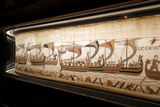 A close-up view of the Bayeux Tapestry, an embroidered cloth which depicts the events leading up to the Norman conquest of England concerning William, Duke of Normandy, and Harold, Earl of Wessex, thought to date to the 11th century, at the Bayeux Museum, France, September 13, 2019.  REUTERS/Charles Platiau/File Photo