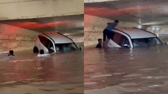 A flooded Thane underpass left an SUV stranded.