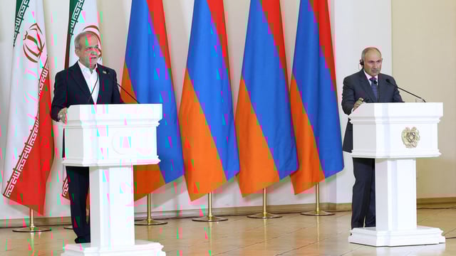 Armenian Prime Minister Nikol Pashinyan and Iranian President Masoud Pezeshkian address the media following their talks in Yerevan, Armenia, 