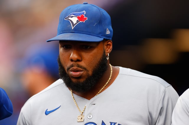 DENVER, CO - AUGUST 5: Vladimir Guerrero Jr. #27 of the Toronto Blue Jays walks in the dugout before taking the field in the second inning against the Colorado Rockies at Coors Field on August 5, 2025 in Denver, Colorado. (Photo by Justin Edmonds/Getty Images)