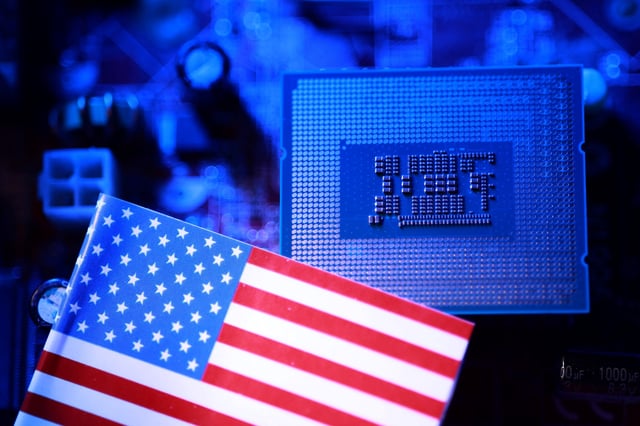Intel processor and U.S. flag are seen in this illustration taken August 19, 2025. REUTERS/Dado Ruvic/Illustration