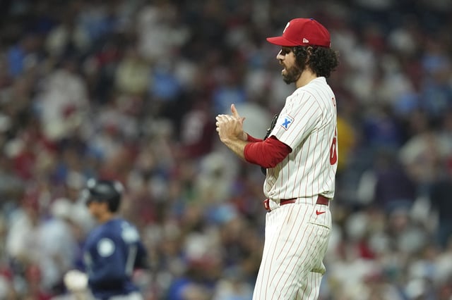PHILADELPHIA, PENNSYLVANIA - AUGUST 18: Jordan Romano #68 of the Philadelphia Phillies looks on after allowing a three-run home run to Cole Young #2 of the Seattle Mariners in the top of the seventh inning at Citizens Bank Park on August 18, 2025 in Philadelphia, Pennsylvania. The Phillies defeated the Mariners 12-7.