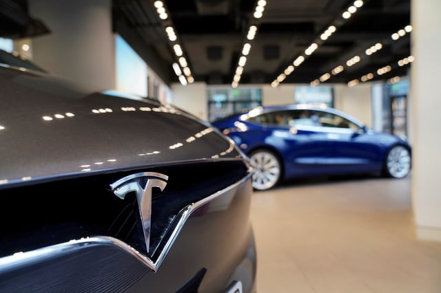 A Tesla logo is seen at a Tesla showroom in Shanghai, China January 7, 2019. REUTERS/Aly Song/File Photo