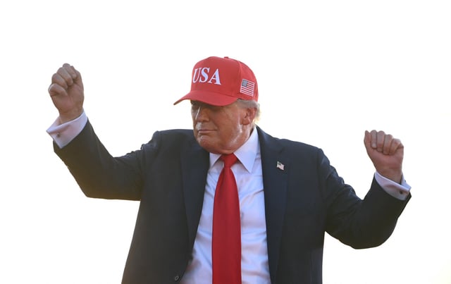 Donald Trump dances as he leaves the stage after speaking at the Salute to America Celebration at the Iowa State Fairgrounds in Des Moines
