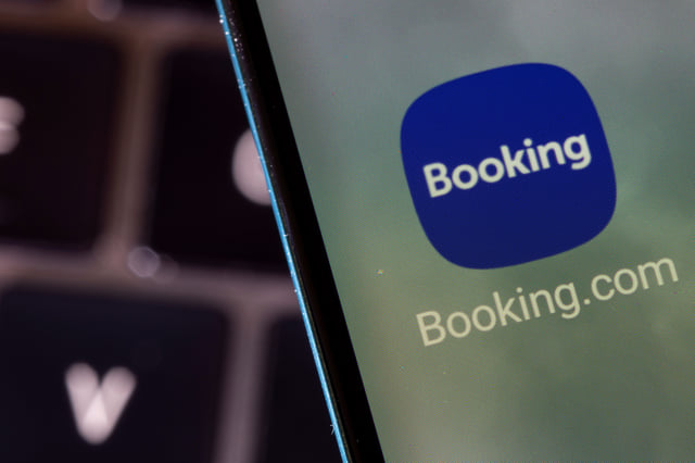 Booking.com app is seen on a smartphone in this illustration taken February 27, 2022. REUTERS/Dado Ruvic/Illustration/File Photo