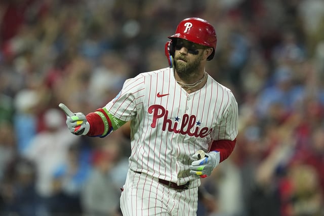 PHILADELPHIA, PENNSYLVANIA - AUGUST 18: Bryce Harper #3 of the Philadelphia Phillies reacts after hitting a two run home run in the bottom of the seventh inning against the Seattle Mariners at Citizens Bank Park on August 18, 2025 in Philadelphia, Pennsylvania. The Phillies defeated the Mariners 12-7. (Photo by Mitchell Leff/Getty Images)