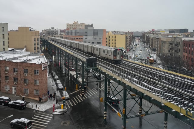 A subway train runs on snow-covered tracks during a snowfall in New York City, U.S., February 6, 2025. REUTERS/David 'Dee' Delgado/File Photo