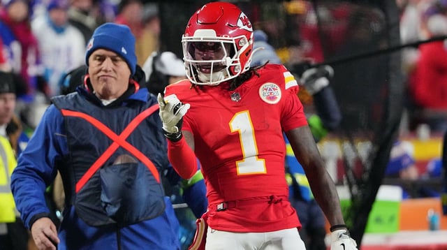 Jan 26, 2025; Kansas City, MO, USA; Kansas City Chiefs wide receiver Xavier Worthy (1) reacts against the Buffalo Bills during the first half in the AFC Championship game at GEHA Field at Arrowhead Stadium. Mandatory Credit: Denny Medley-Imagn Images.